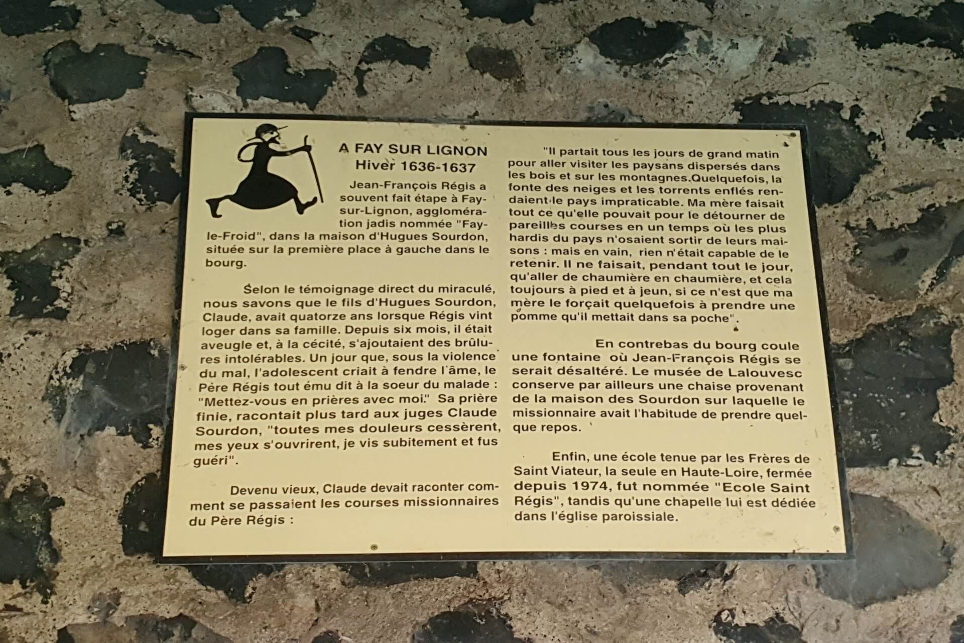 Description plaque de la fontaine St Regis à Fay sur Lignon